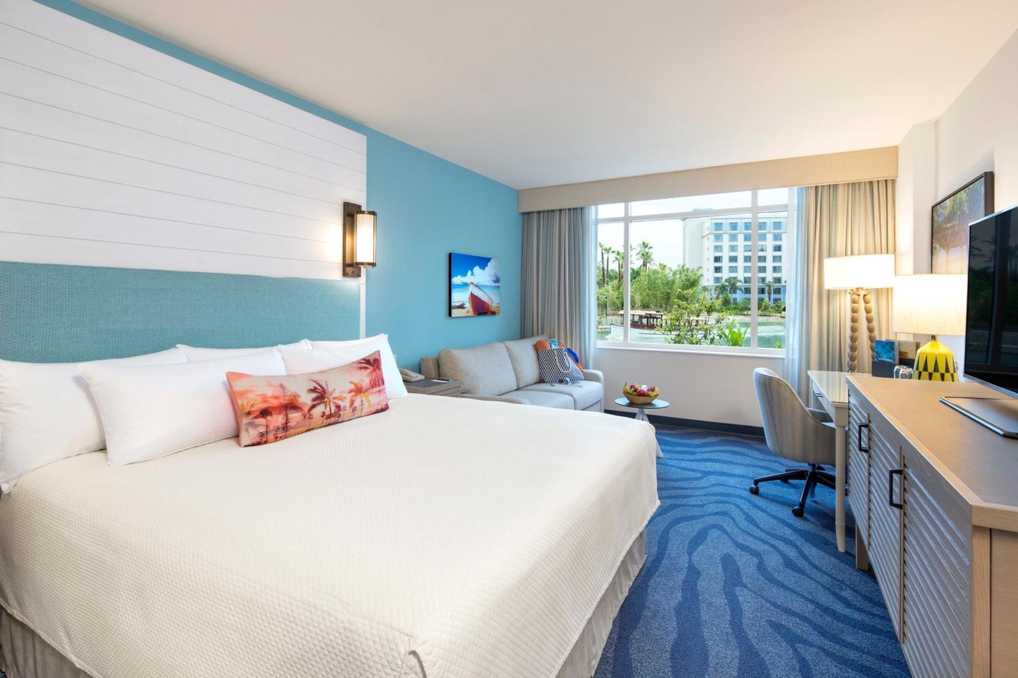 Zimmer mit Kingsize-Bett und Poolblick - inklusive frühem Eintritt zum Park *)